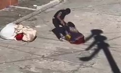 Eşini sokak ortasında darp etti