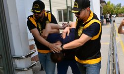 Komşusunun evine kurşun yağdıran şüpheli saklandığı dairede yakalandı
