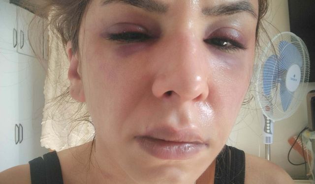 Eşinin boğazına bıçak dayadı