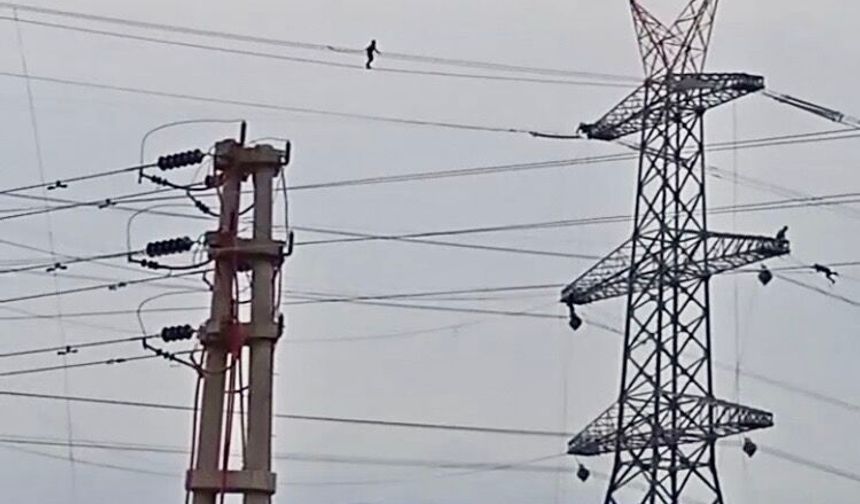 Metrelerce Yüksekte Tehlikeli Mesai: Elektrik İşçileri İp Cambazlarını Aratmadı