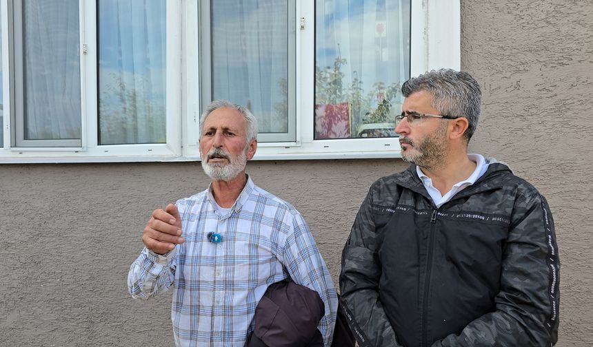 Evinin yıkımına engel olmak için benzin bidonuyla çatıya çıktı